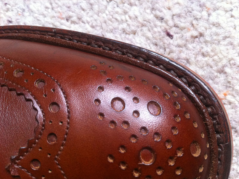 A detail of the clean new stitching, expertly replaced