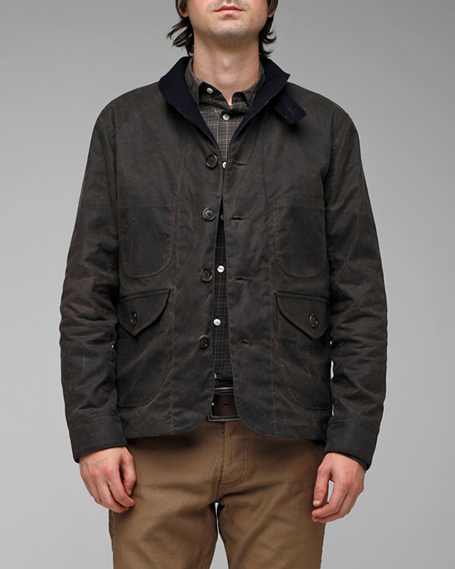 The waxed Hill Climber jacket from Taylor Supply. The least accurate in style, but the closest in fabrics